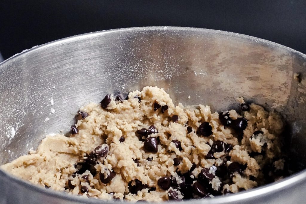 A picture of a bowl of dough. The dough is ready to be mixed together and put in the oven. The dough will make a Cornish baked good ready for a picnic. 